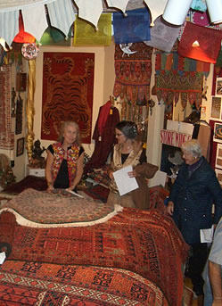 Eileen Jorgensen is hard at work, sharing the beauty of Oriental rugs.